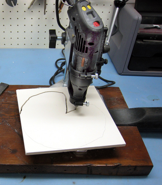 Cutting bisque tile with diamond bit.