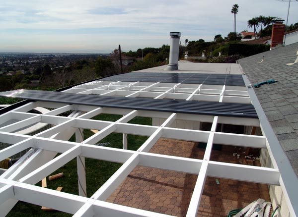 Installing polycarbonate roofing.