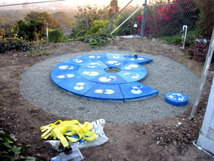 Assembly on a bed of gravel.