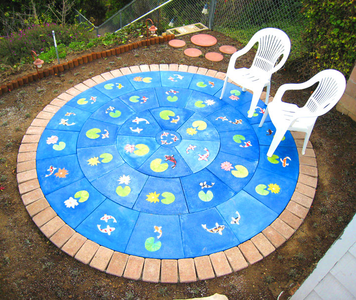 Finished patio mirrors the nearby Koi pond.