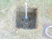 Post footing with 5/8-inch stailess steel threaded rod.