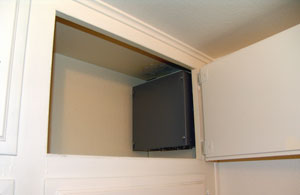 Ropelight power supply in laundry room cabinet.